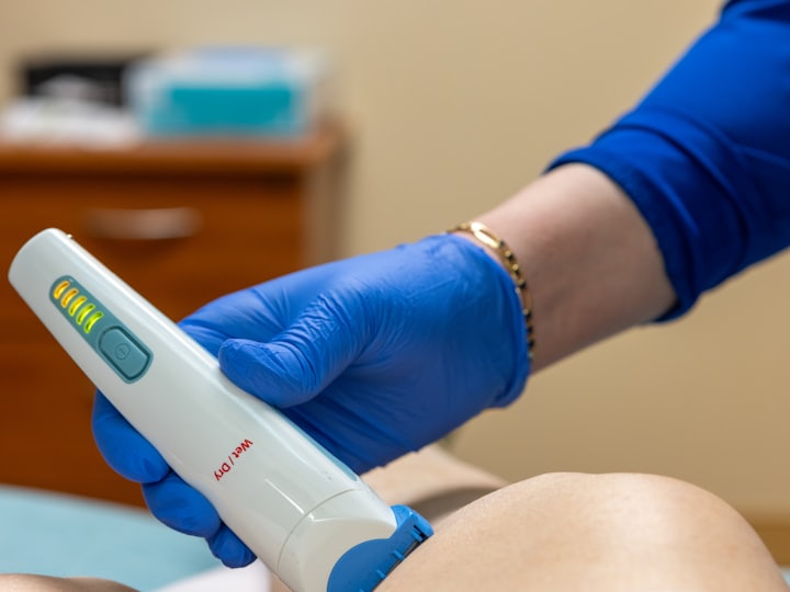 Close-up of a digital skin-analysis device being used during an assessment
